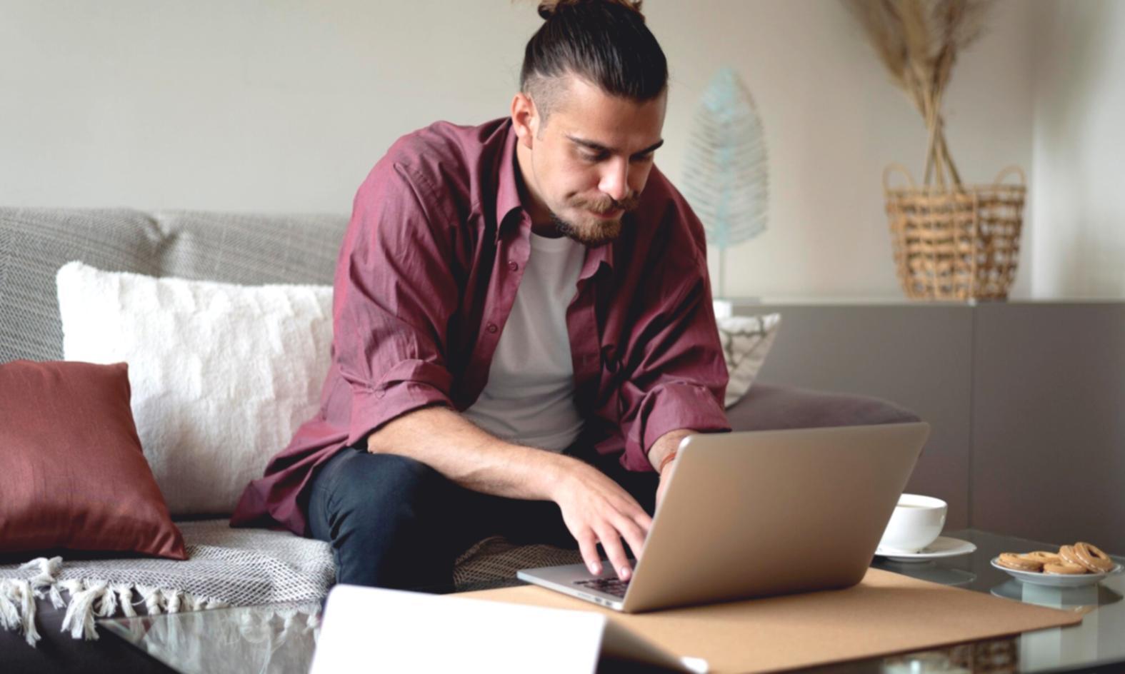 Person reviewing simple budget plan with coffee